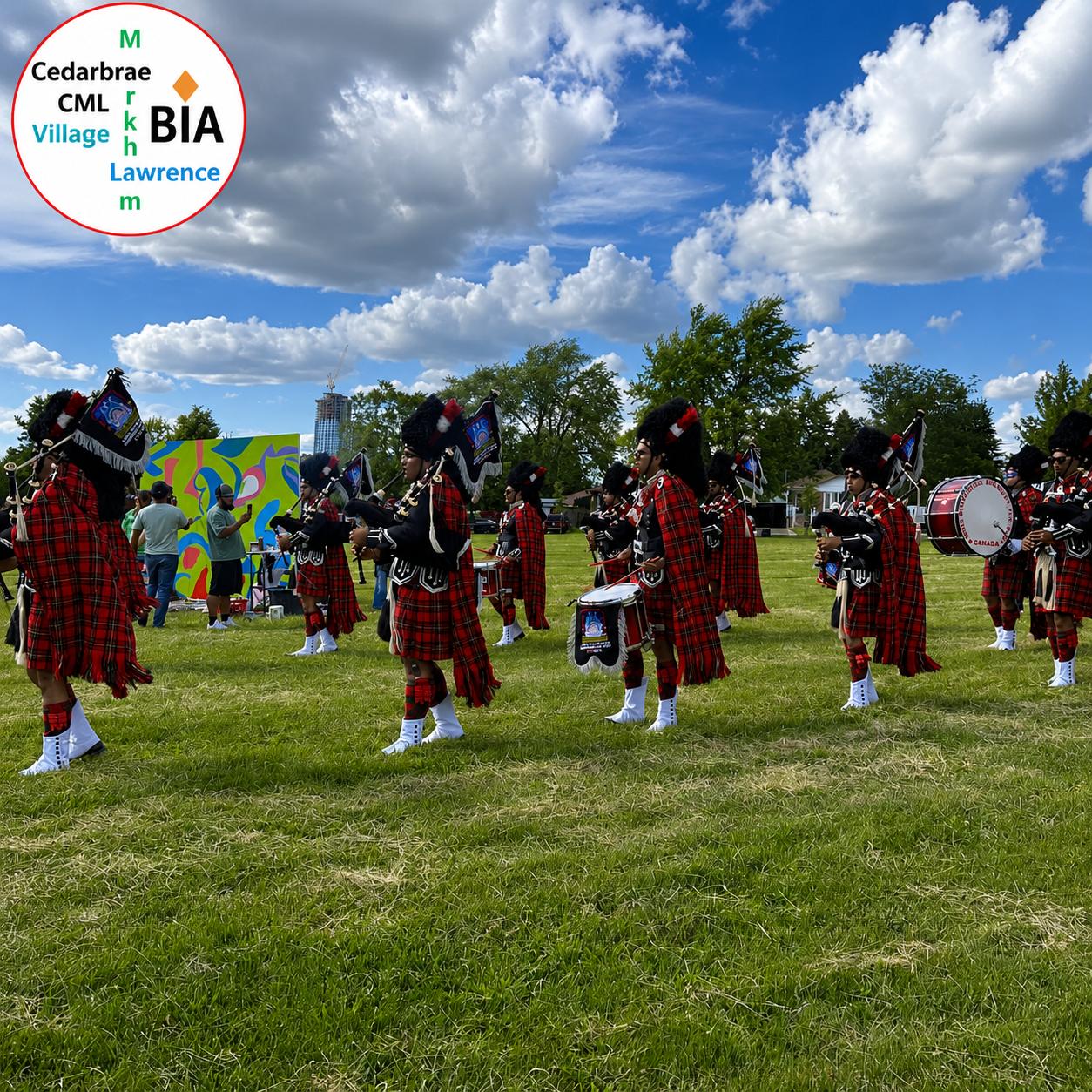 CML Village BIA branded photo of the bagpipe performance