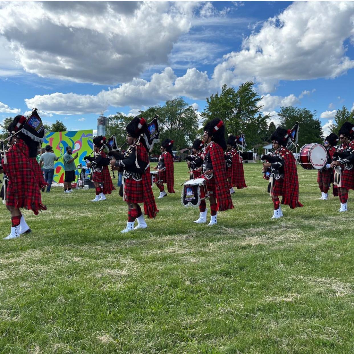 Bagpipe band performing at the FIFA Fan Fest 2026 community event